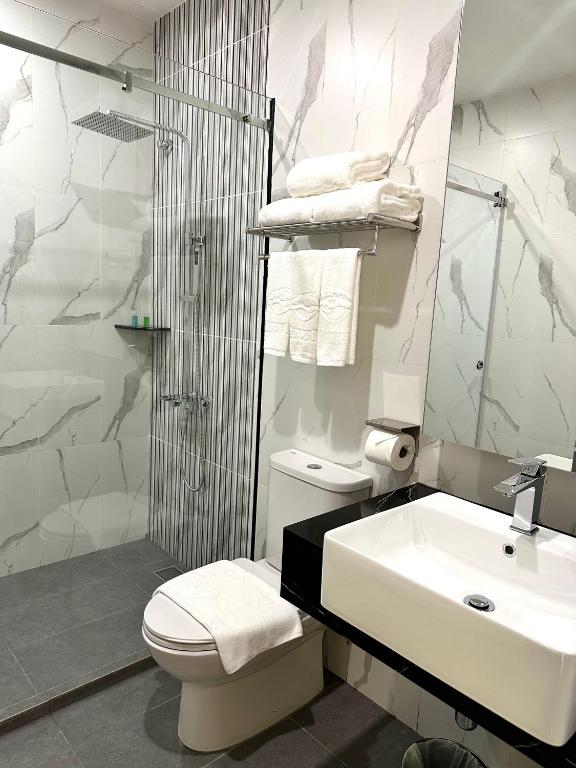 Koupelna v ubytování Wendu Inn Hotel