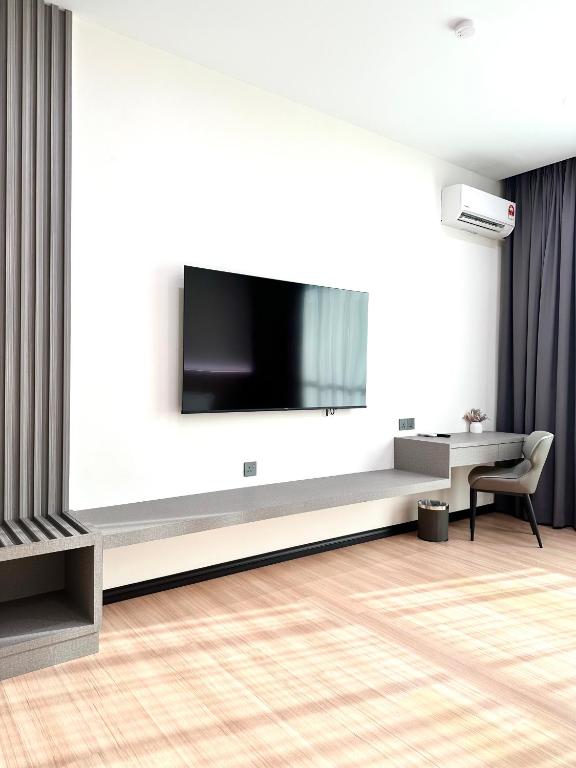 TV a/nebo společenská místnost v ubytování Wendu Inn Hotel