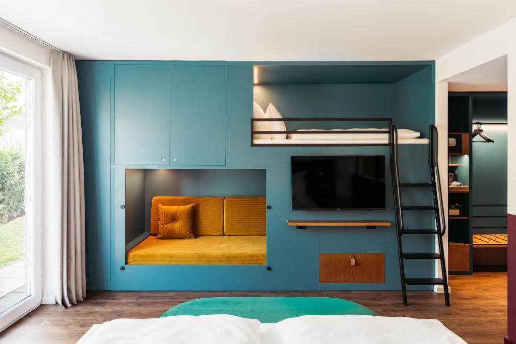 Postel nebo postele na pokoji v ubytování Hotel Schani UNO City