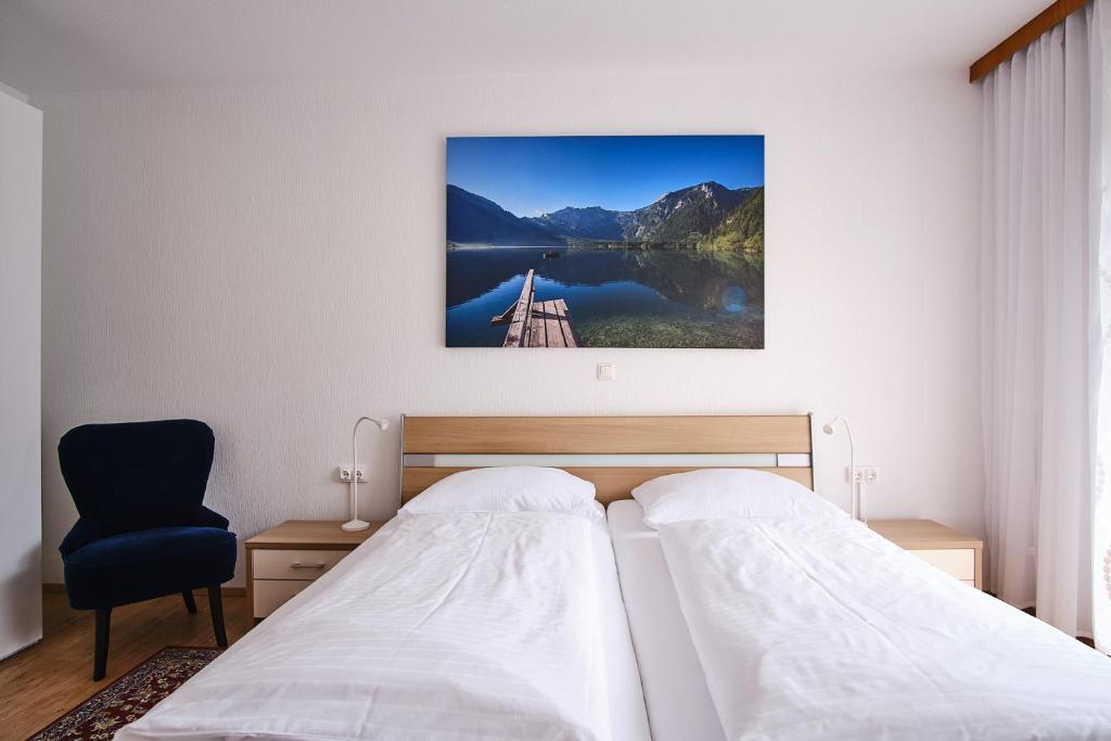Ένα ή περισσότερα κρεβάτια σε δωμάτιο στο Appartements Das Charlie