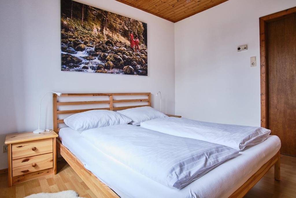 Ένα ή περισσότερα κρεβάτια σε δωμάτιο στο Appartements Das Charlie
