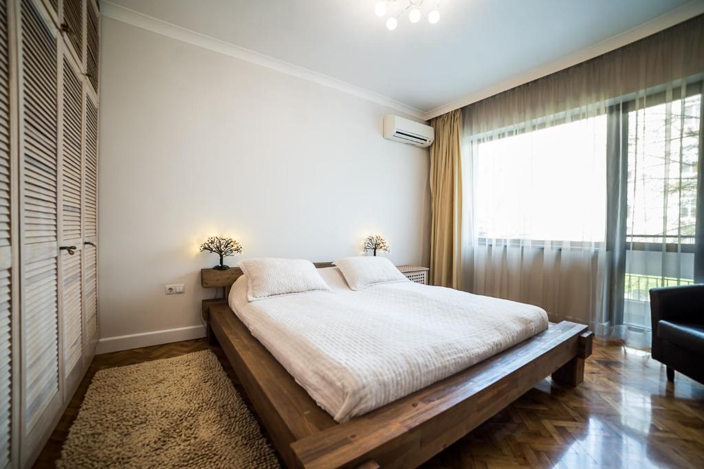 Postel nebo postele na pokoji v ubytování Apartment Antique Theatre 2