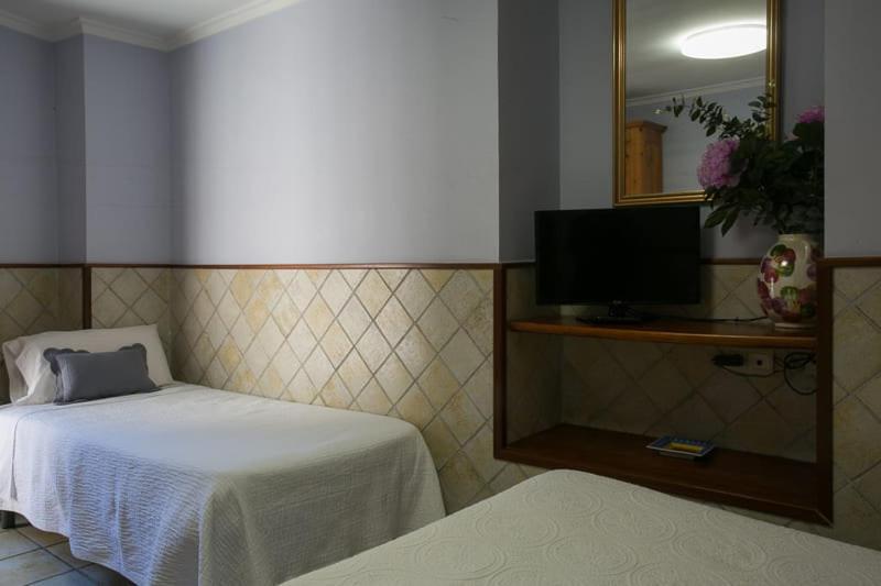 Postel nebo postele na pokoji v ubytování Estudios Casa Lola de Talarn