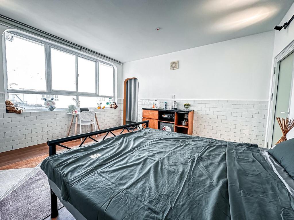 Postel nebo postele na pokoji v ubytování La Casa Di Dicembre HCMC