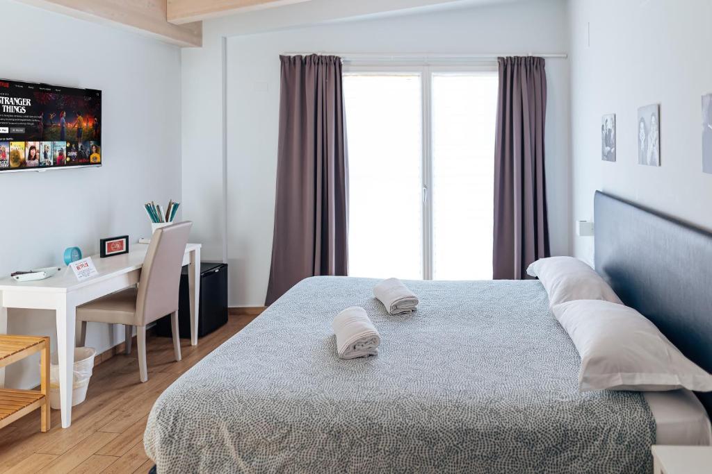 Postel nebo postele na pokoji v ubytování Cufà