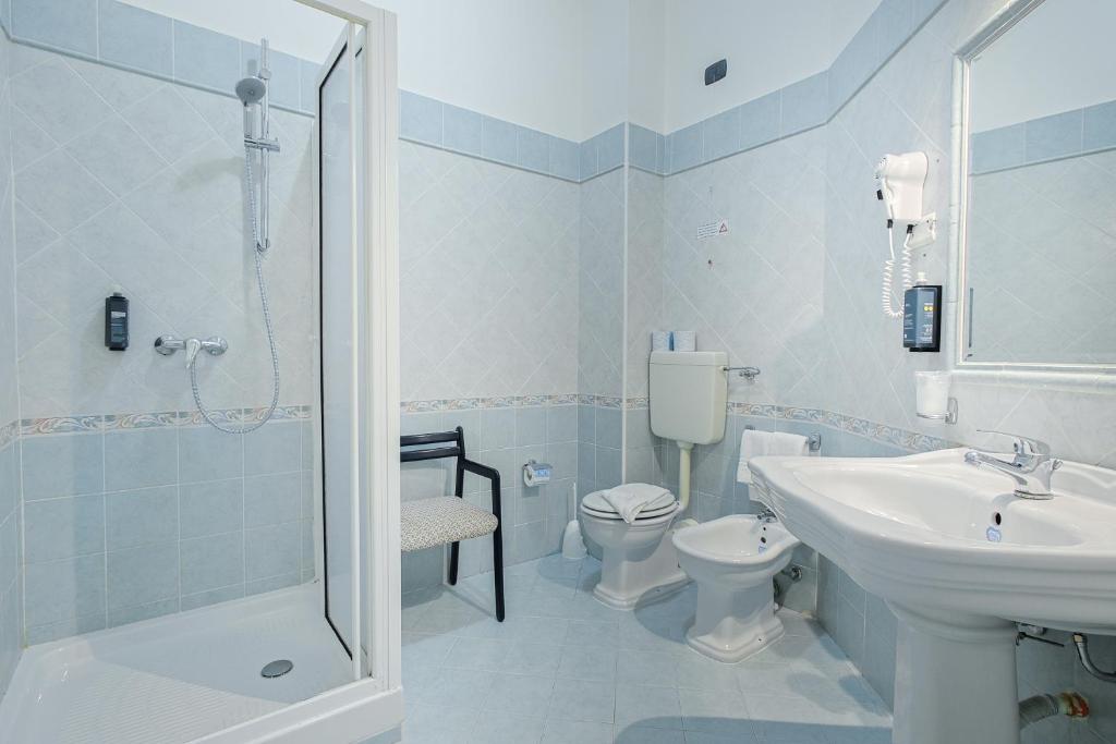 Koupelna v ubytování Hotel Tourist