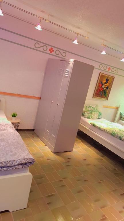 Кровать или кровати в номере Monteurzimmer, Monteurunterkunft in 20 km von Hanau und 35 km von Frankfurt am main