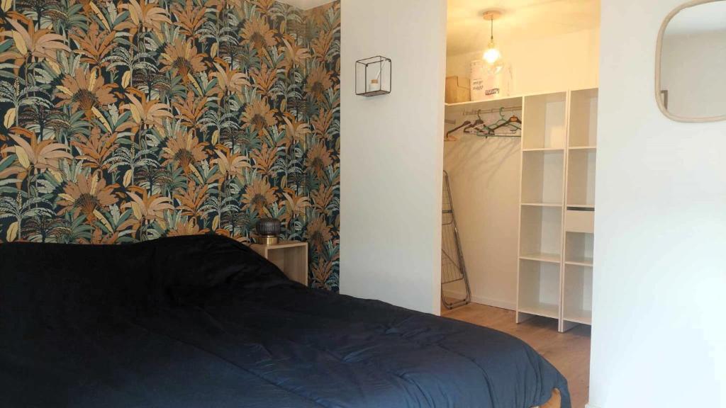 Ένα ή περισσότερα κρεβάτια σε δωμάτιο στο Maison de bourg - wifi - checkin autonome