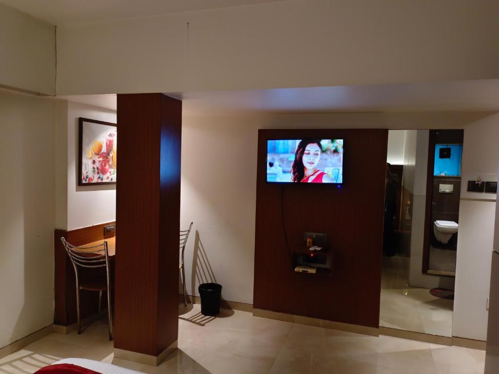 Телевізор і / або розважальний центр в Hotel Express INN, Panvel