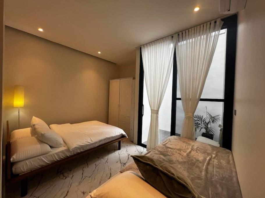 Postel nebo postele na pokoji v ubytování Casa Serene Tagaytay (Pool, Deluxe, Relaxing Stay)