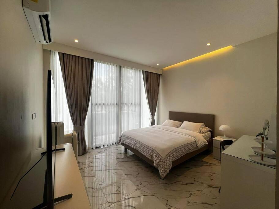 Postel nebo postele na pokoji v ubytování Casa Serene Tagaytay (Pool, Deluxe, Relaxing Stay)