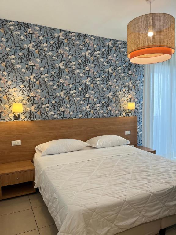 Postel nebo postele na pokoji v ubytování Hotel Majorca sul Mare in centro a Riccione