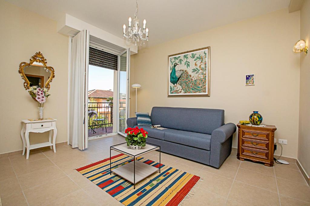 Część wypoczynkowa w obiekcie Villa Mimosa Appartamento 5 - Happy Rentals