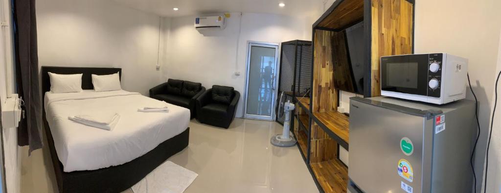 Postel nebo postele na pokoji v ubytování Amazing Inn Koh Tao