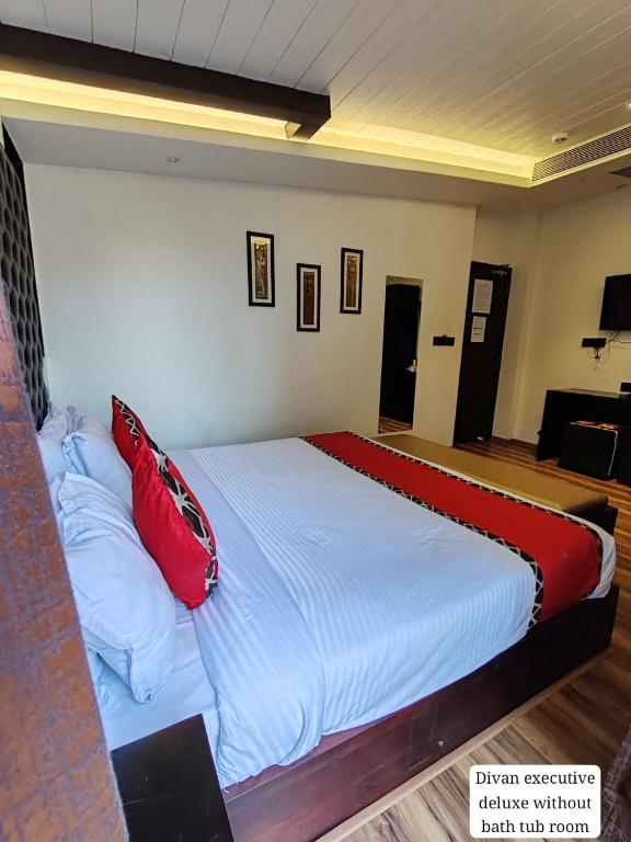 Postel nebo postele na pokoji v ubytování Divan Clarks Inn Goa