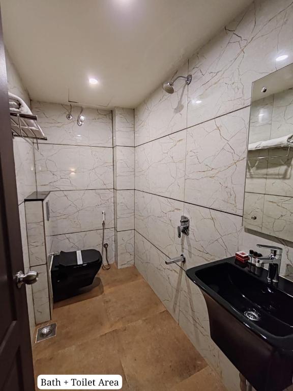 Koupelna v ubytování Divan Clarks Inn Goa