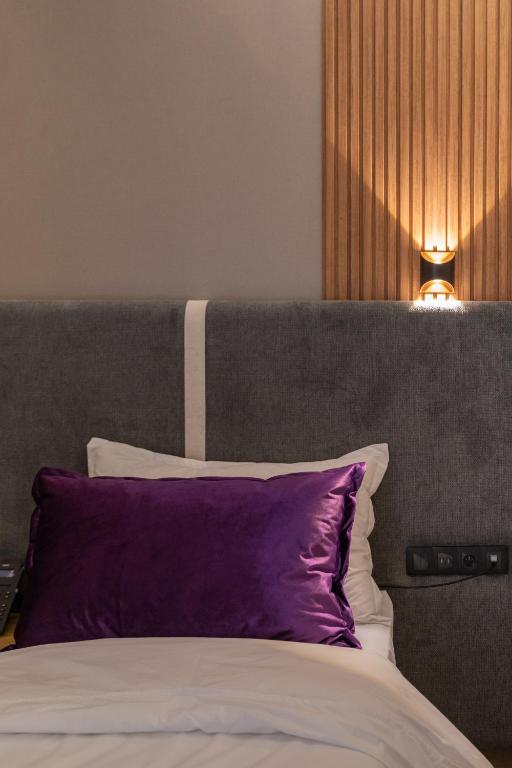 Postel nebo postele na pokoji v ubytování Appart Hôtel Rambla