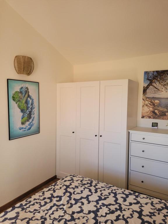 Postel nebo postele na pokoji v ubytování Surf House Mirice