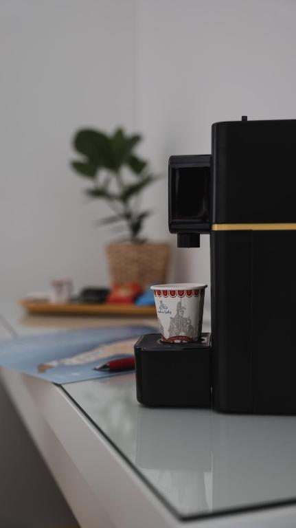 Příslušenství pro přípravu čaje a kávy v ubytování Central Perk