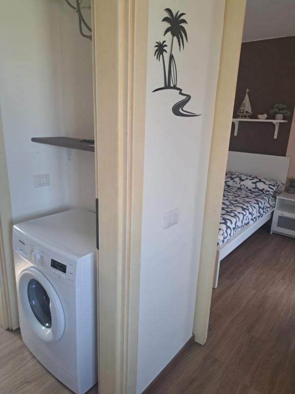 Postel nebo postele na pokoji v ubytování Surf House Mirice