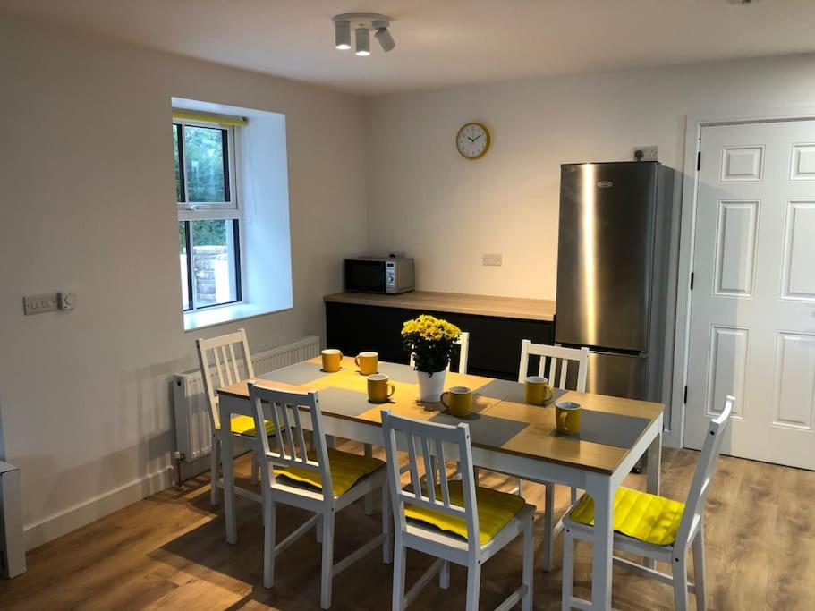 Kuchyň nebo kuchyňský kout v ubytování Sunville Cottage