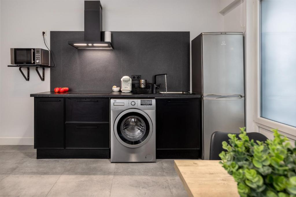 Kuchyňa alebo kuchynka v ubytovaní Egona -Apartamentos Itxaropena Zarautz
