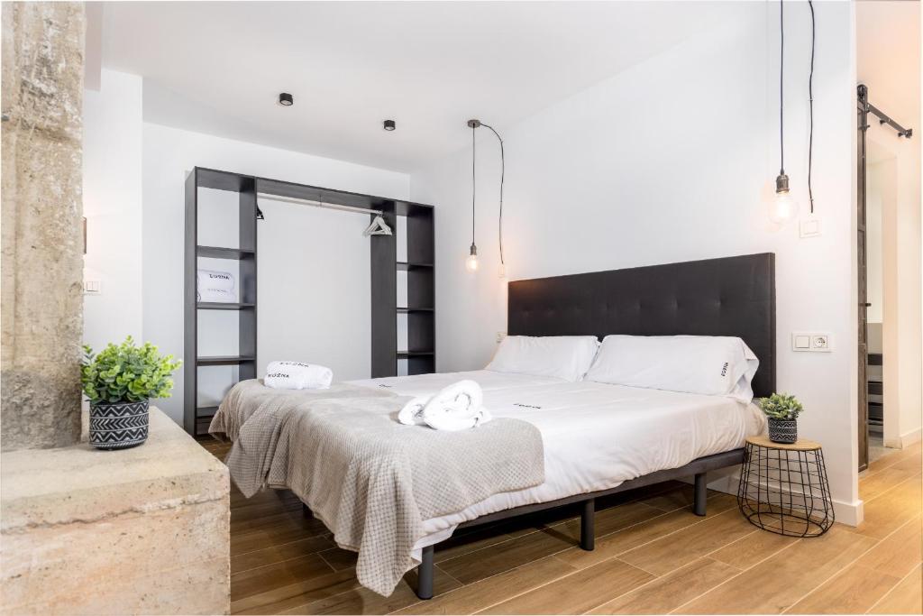 Posteľ alebo postele v izbe v ubytovaní Egona -Apartamentos Itxaropena Zarautz