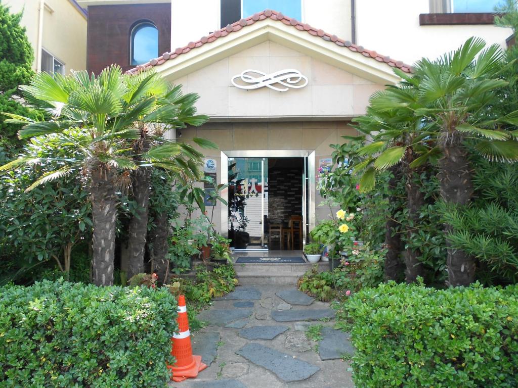 a house with a large olympics sign on it at Charmant Hotel in Mokpo