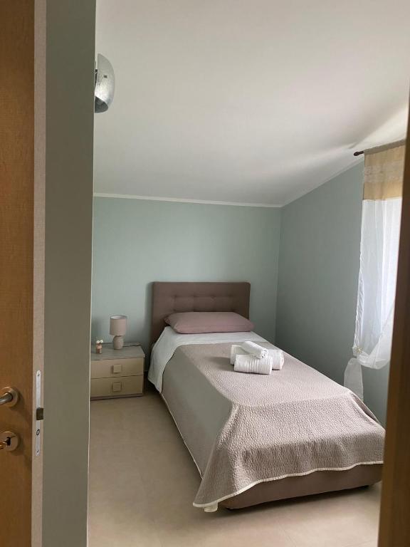 Postel nebo postele na pokoji v ubytování B&B La Terrazza