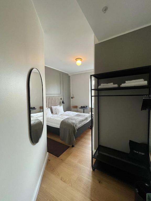 Postel nebo postele na pokoji v ubytování Hotel Sct. Thomas