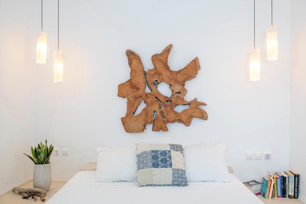 Кровать или кровати в номере Archipelago Sifnos - Seaside Accommodation