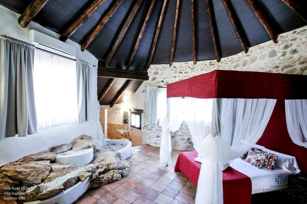 Postel nebo postele na pokoji v ubytování Living4Malaga Villas Rurales Grazalema