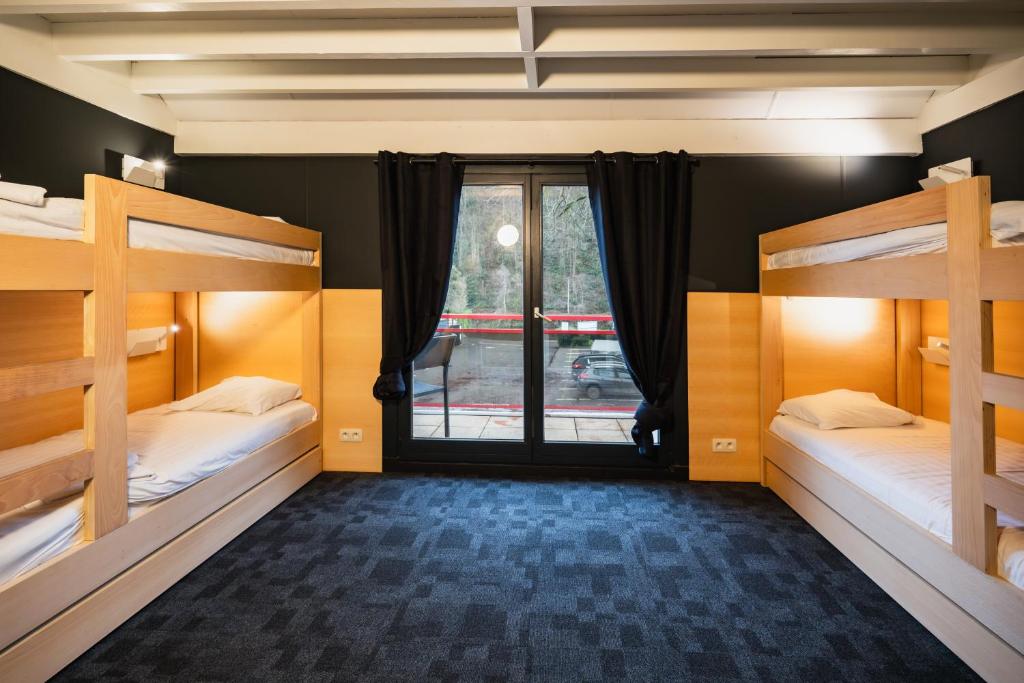 Postel nebo postele na pokoji v ubytování Hotel Aquatel