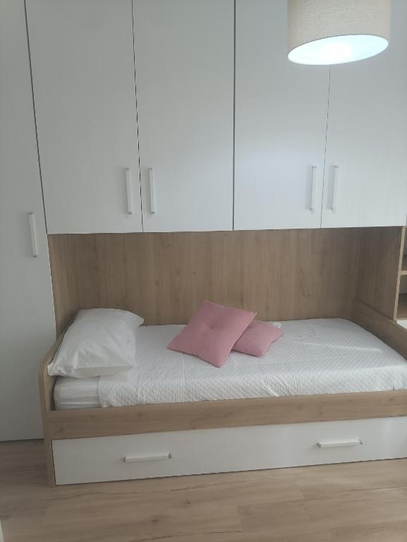 Postel nebo postele na pokoji v ubytování La Casa di Ary