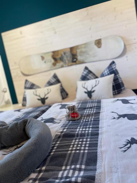 Postel nebo postele na pokoji v ubytování Ferienwohnung Ambiente