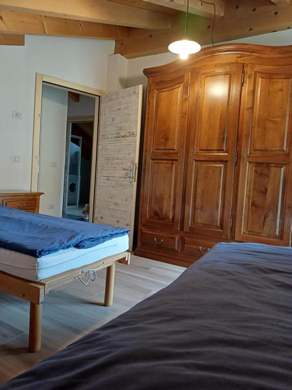 Postel nebo postele na pokoji v ubytování Casa Bresadola - Pellizzano