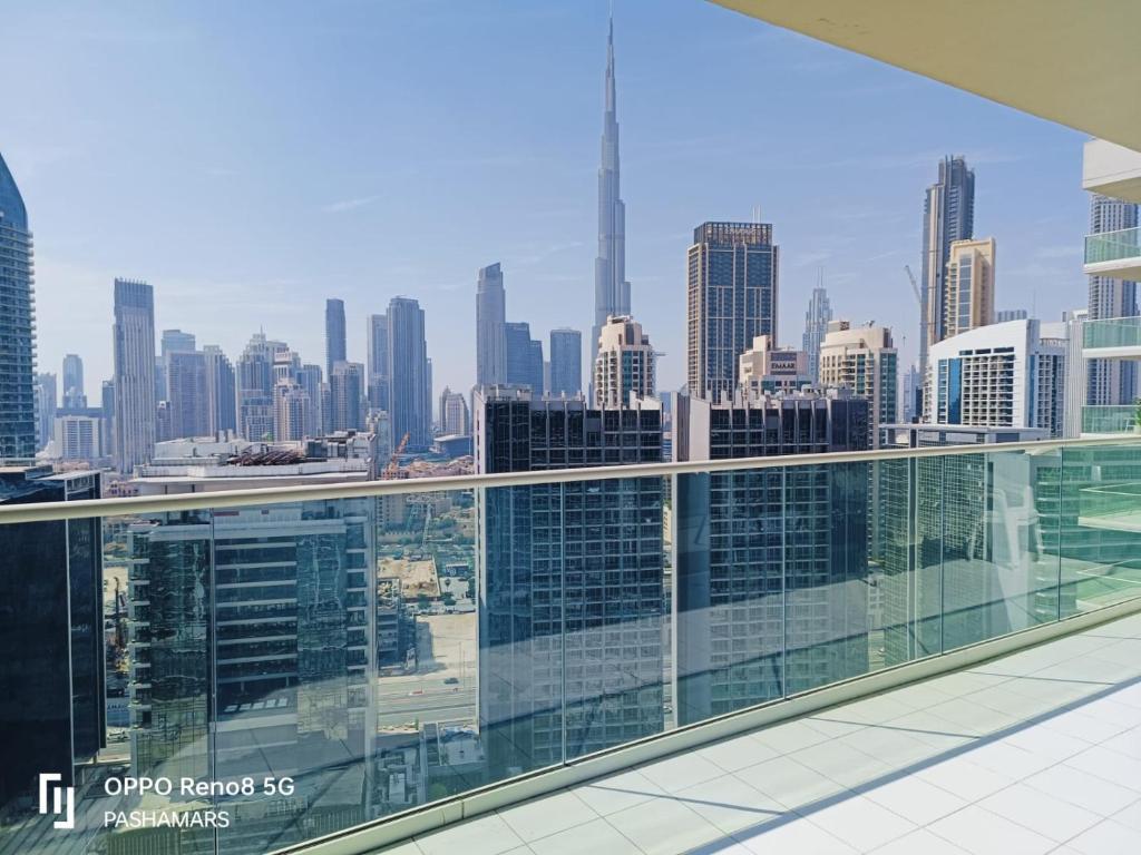 a view of a city skyline from an office building at Reva Residence Luxurious 2 BHK in Dubai
