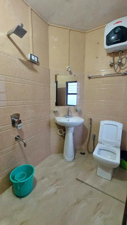 Koupelna v ubytování Indivar Homestay