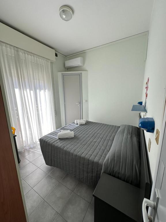 Postel nebo postele na pokoji v ubytování Hotel Austria
