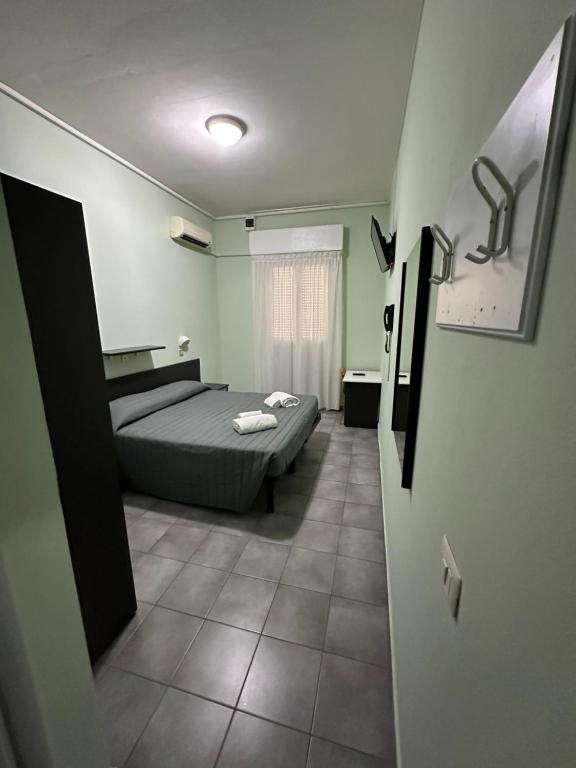 Postel nebo postele na pokoji v ubytování Hotel Austria