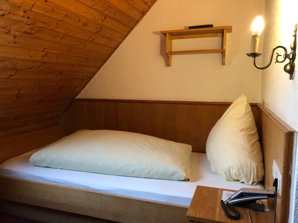 Postel nebo postele na pokoji v ubytování Hotel Wurzer
