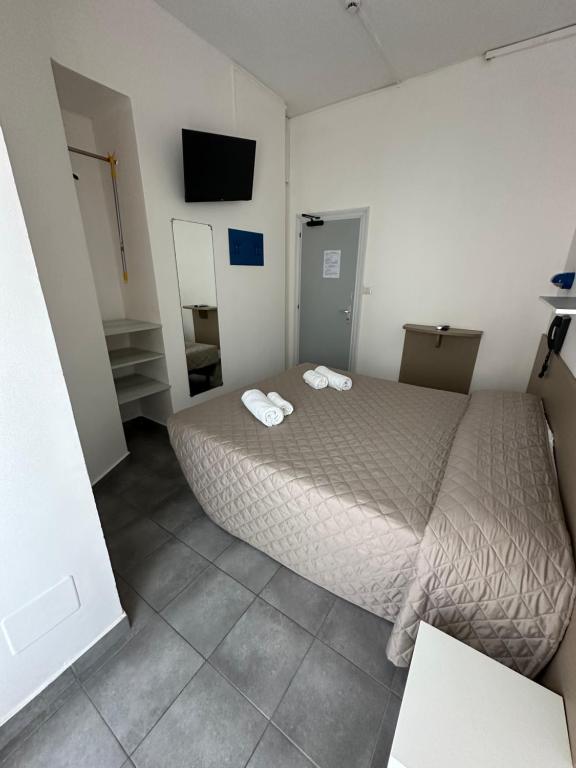 Postel nebo postele na pokoji v ubytování Hotel Austria