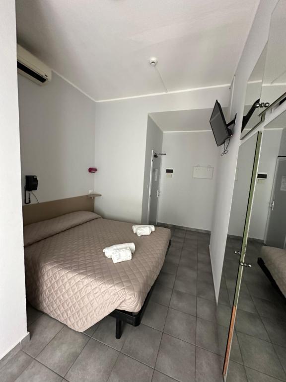 Postel nebo postele na pokoji v ubytování Hotel Austria