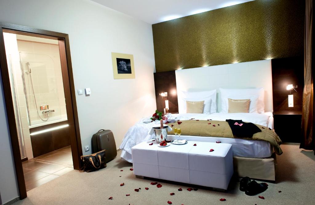 Postel nebo postele na pokoji v ubytování Hotel Turiec
