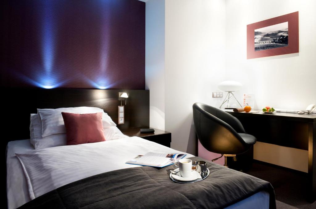 Postel nebo postele na pokoji v ubytování Hotel Turiec
