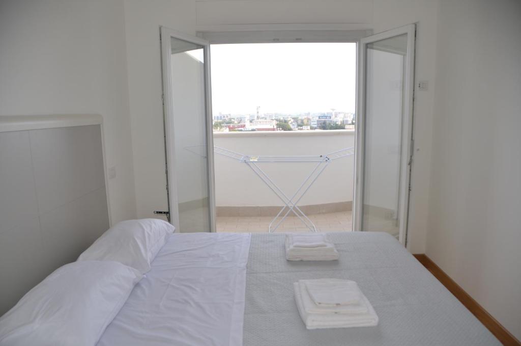 Postel nebo postele na pokoji v ubytování Suite 39 tra Roma e il mare