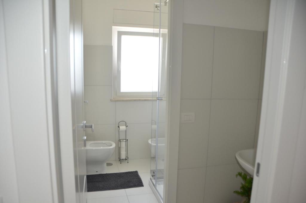 Koupelna v ubytování Suite 39 tra Roma e il mare
