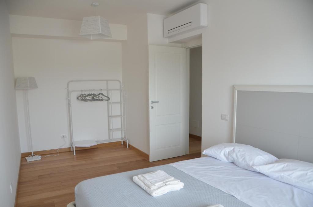 Postel nebo postele na pokoji v ubytování Suite 39 tra Roma e il mare