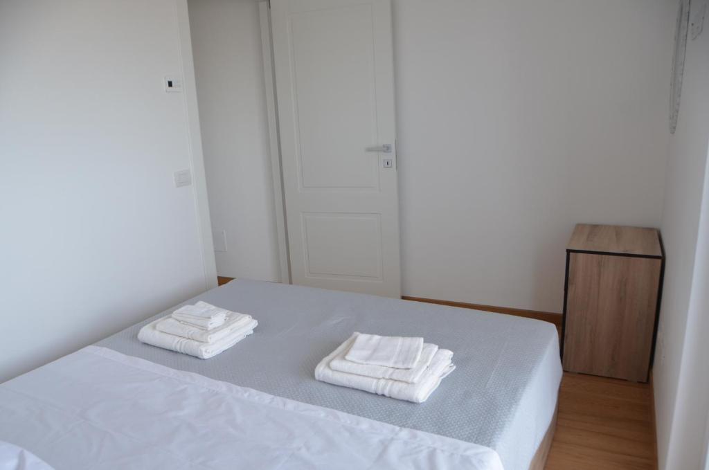 Postel nebo postele na pokoji v ubytování Suite 39 tra Roma e il mare