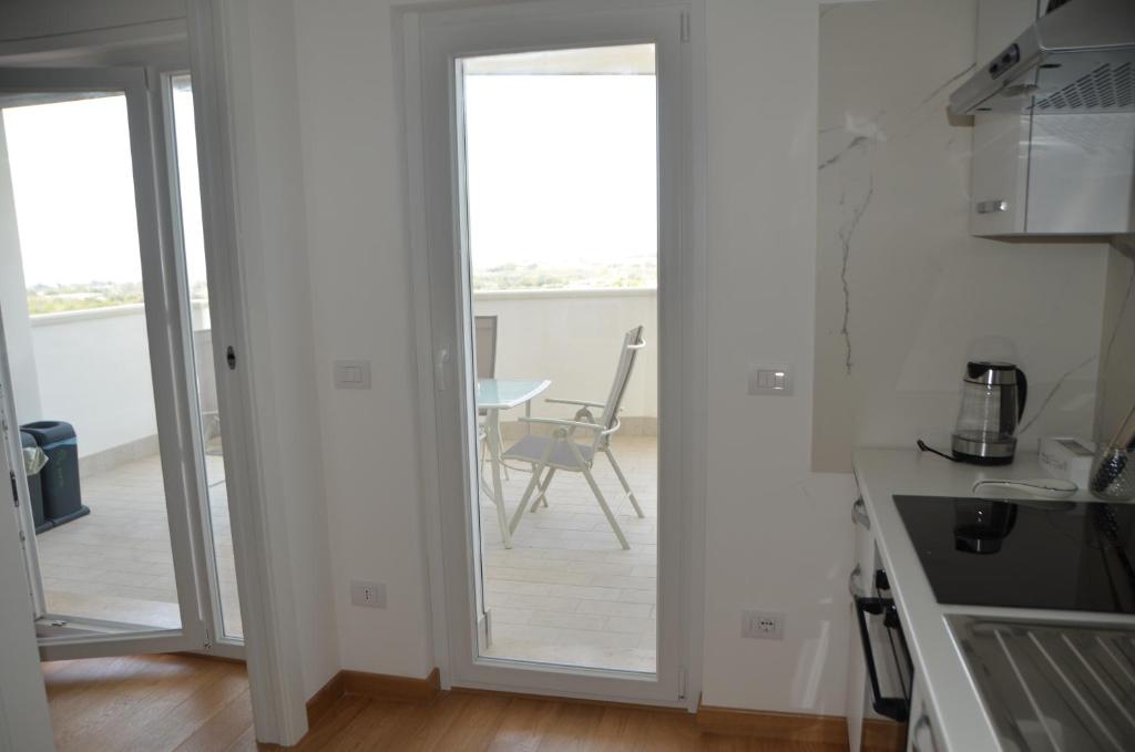 Kuchyň nebo kuchyňský kout v ubytování Suite 39 tra Roma e il mare